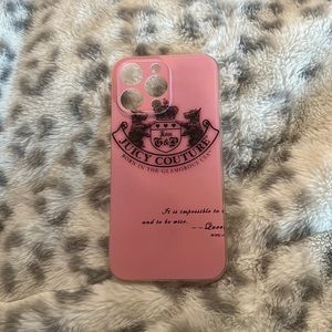 I’m selling an iPhone 14 pro max juicy couture phone case. In pink and black